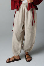 Balloon trousers with elastic waist in Beige