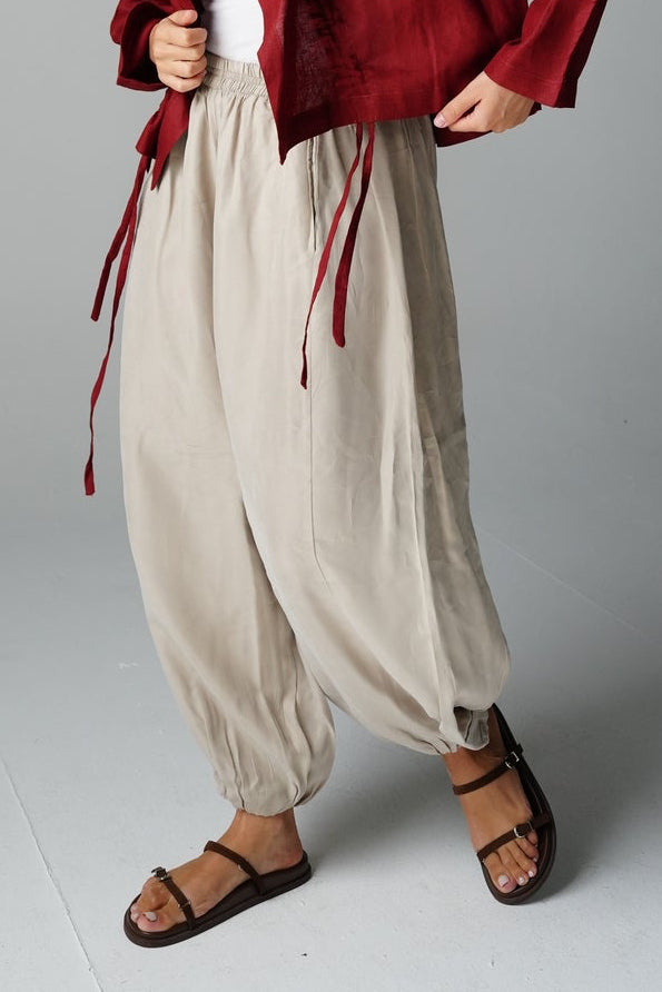 Balloon trousers with elastic waist in Beige
