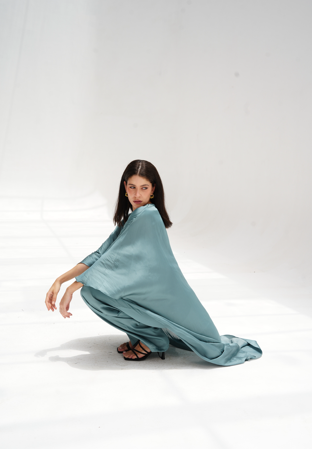 High-low satin blouse in aqua blue