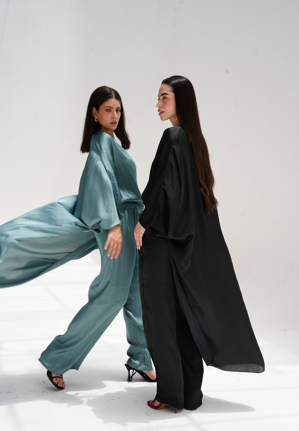 High-low satin blouse in aqua blue
