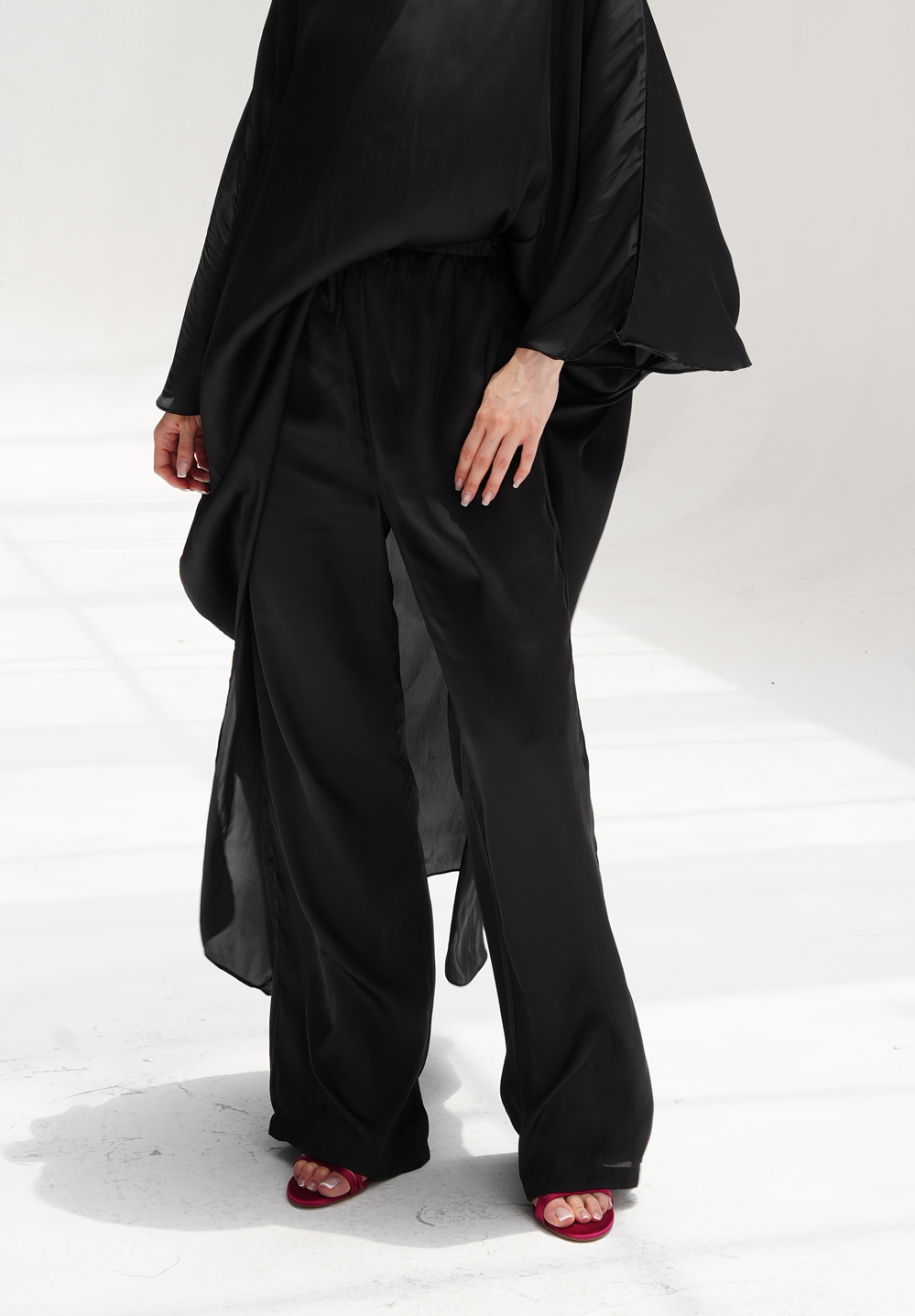 High-low satin blouse in black