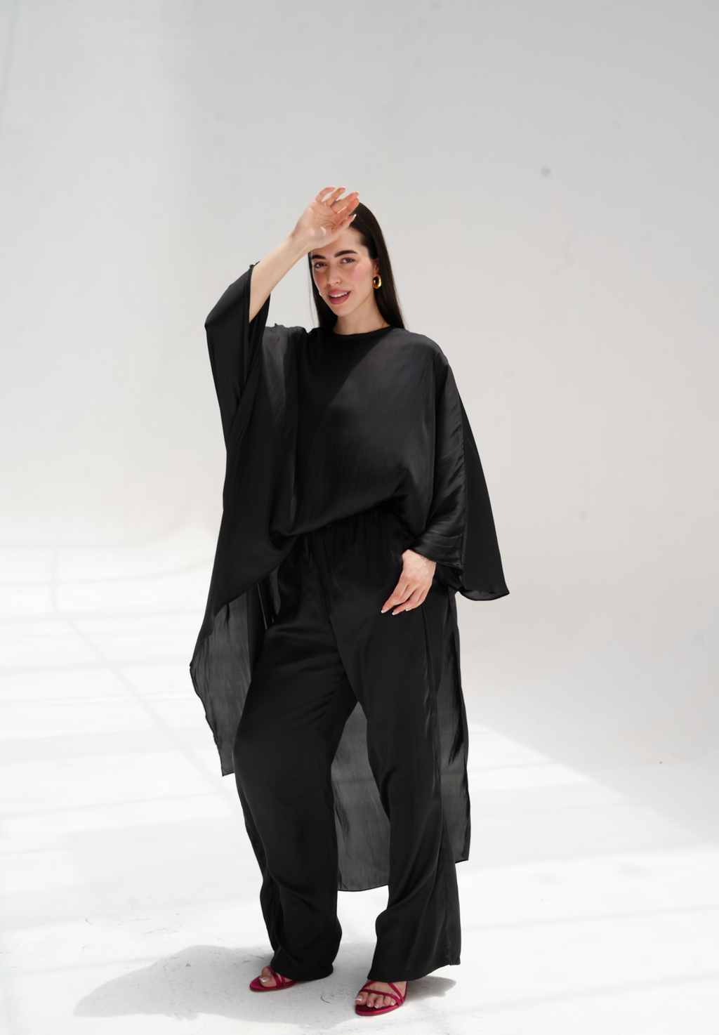 High-low satin blouse in black