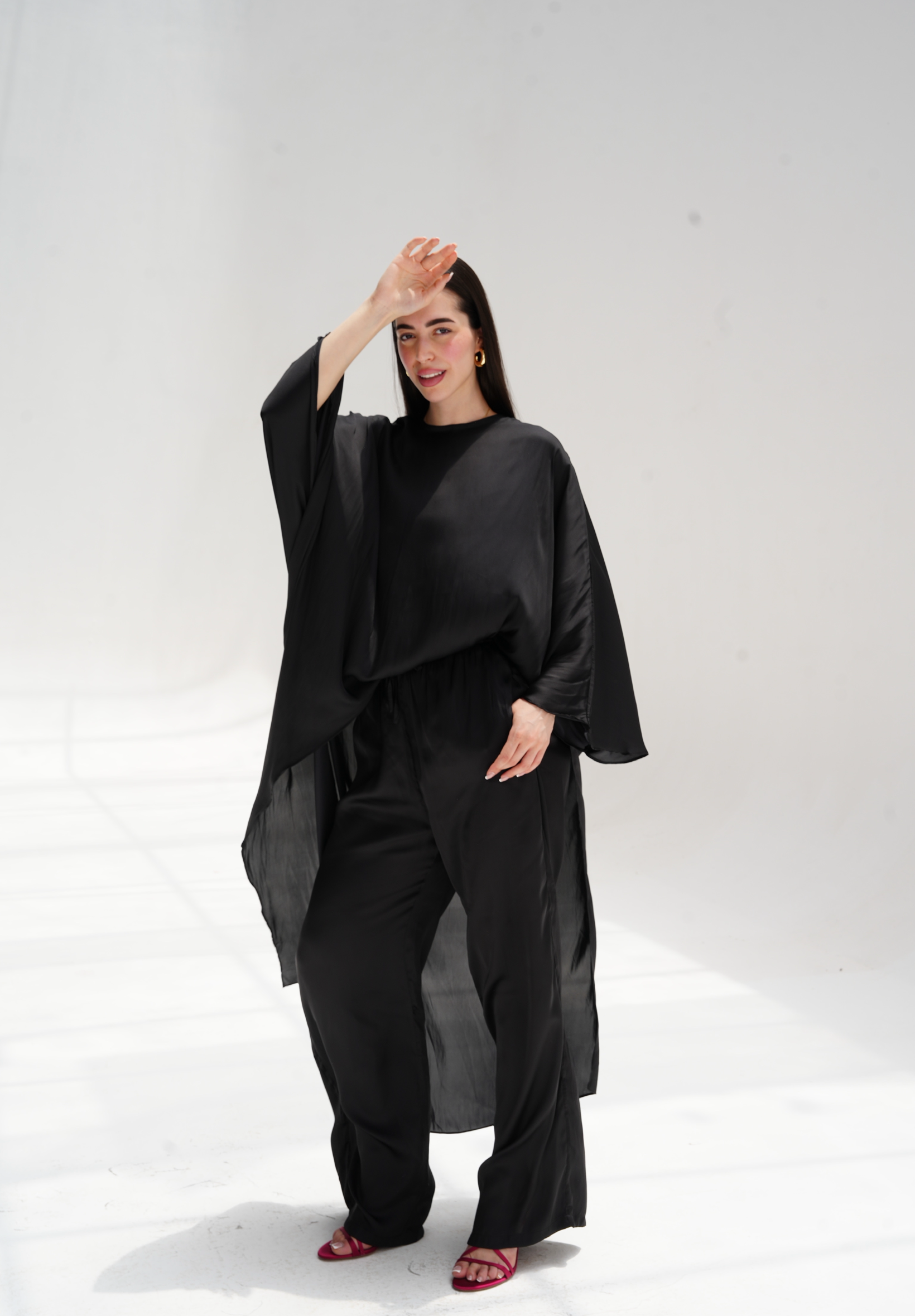 High-low satin blouse in black