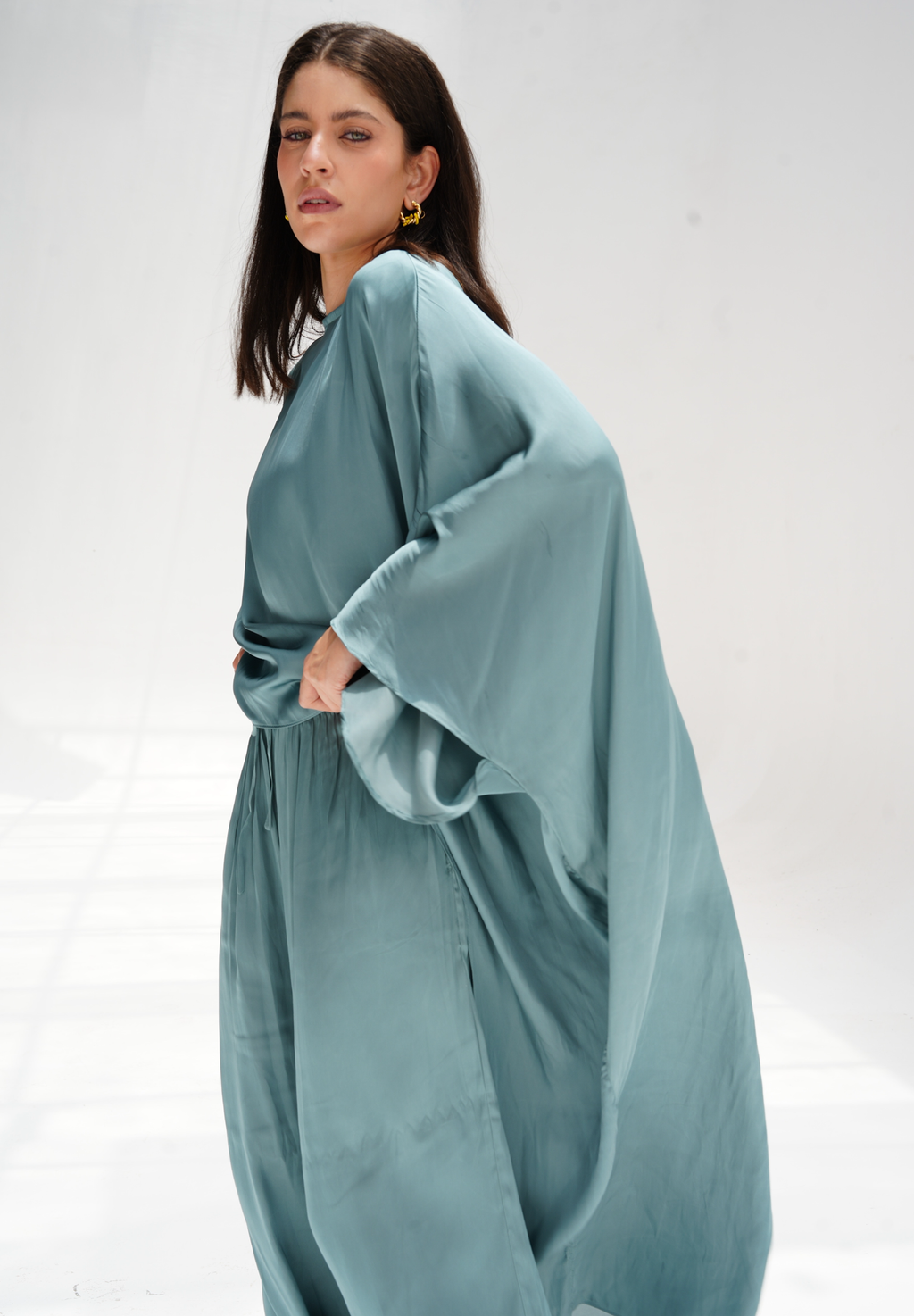 High-low satin blouse in aqua blue