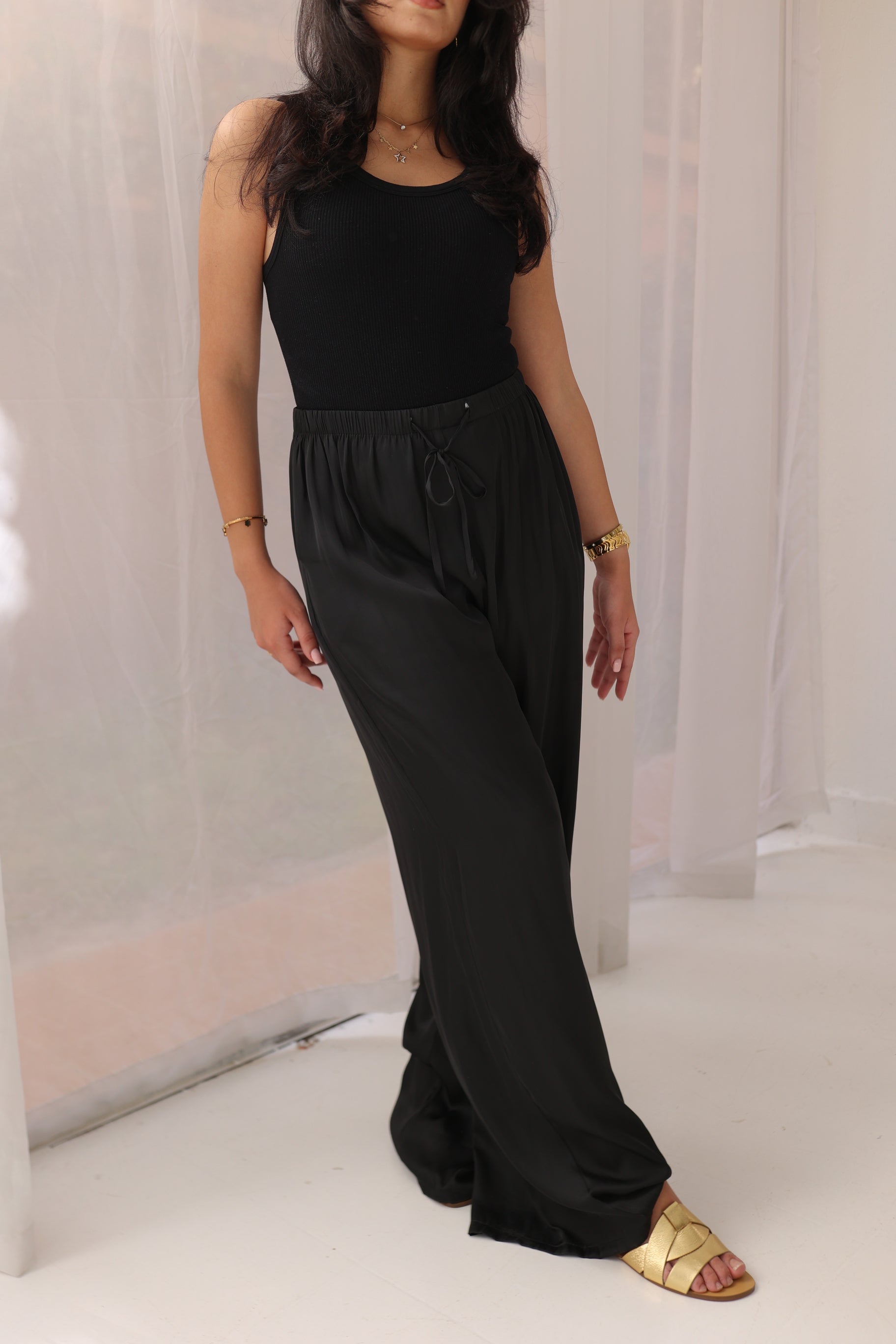 Black satin pants